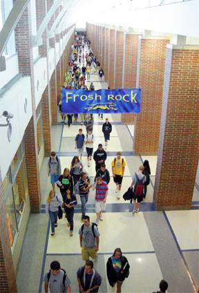 SWIMMING UPSTREAM: During a passing period, students pass through the main hallway on their way to class. Many students here have found it easier to transition to college from a large school like CHS. SARA ROGERS / PHOTO