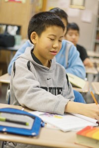 SUNDAY SCHOOL: A Carmel Middle School student participates in poetry reading in the highest level Chinese course. These classes occur every week, and aim to teach both Chinese and adopted Chinese children about their culture. MICHELLE HU / PHOTO