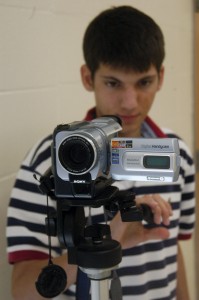 CAMERA READY: Senior Ellis Noto tests out his video camera. He has created films during his free time since the sixth grade. KAITLYN LAMPE / PHOTO