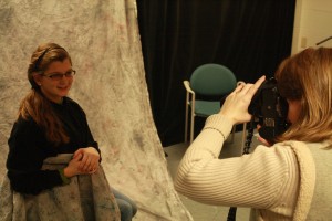 PICTURE PERFECT: Lois Wyant, the Master Photographer at Wyant Photography, shoots a headshot of sophomore Haley Breeden for the Peter Pan production.  According to Wyant, people can contact the company for appointments through the Web site. NICK JOHNSON / PHOTO